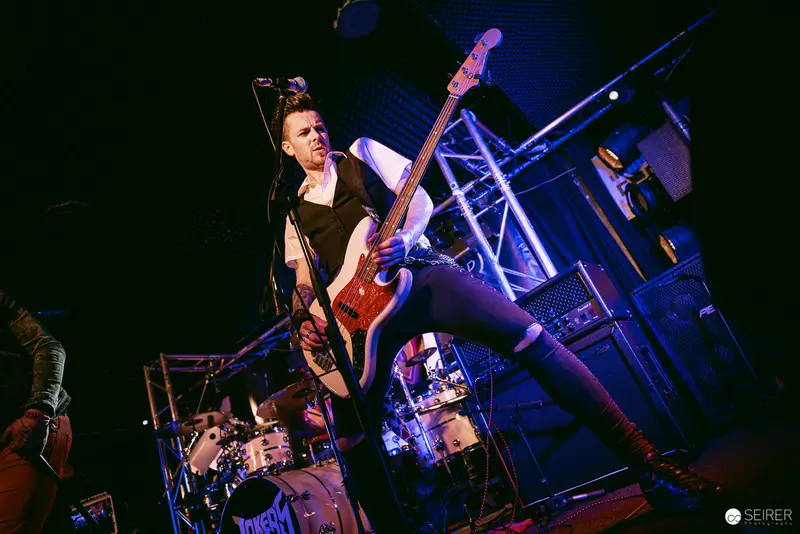 Bassist in Dynamic Performance at Replugged, Vienna during Jokers IV Concert