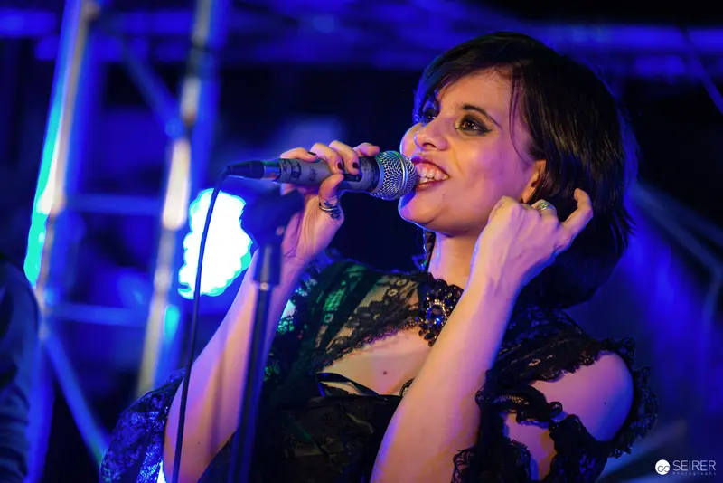 Nightmarcher Vocalist Performing with Intense Energy at Replugged Vienna