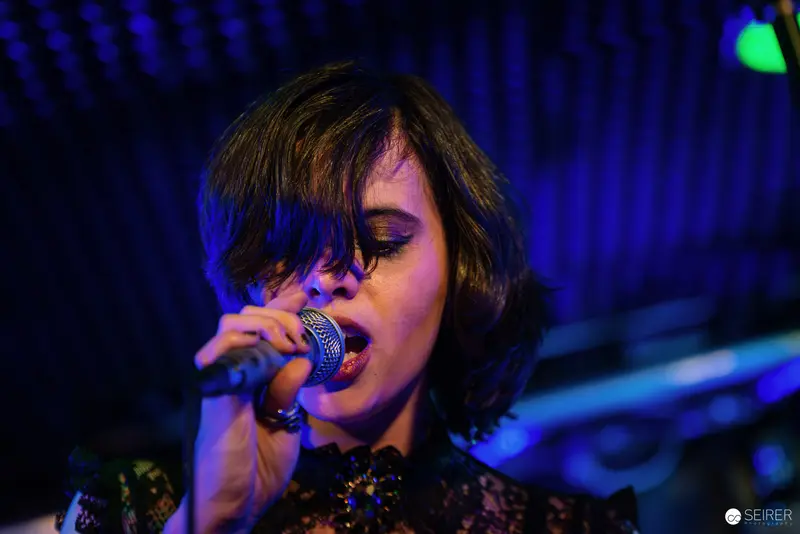 Nightmarcher Vocalist Performing with Intense Emotion at Replugged Vienna