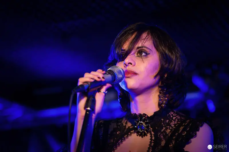 Nightmarcher Performing with Intense Vocal Delivery at Replugged Vienna