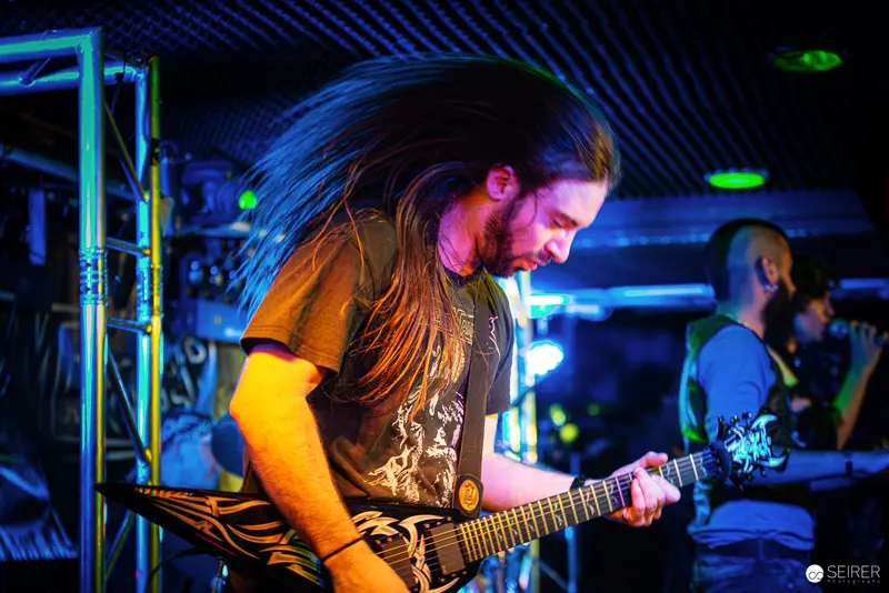 Nightmarcher Guitarist Performs with Intense Energy at Replugged Vienna