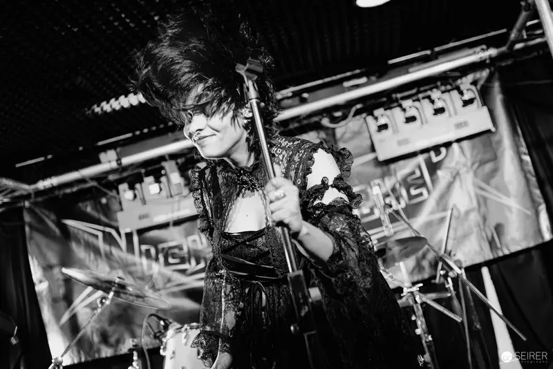 Nightmarcher Performing Intense Set at Replugged Vienna in Dramatic Black and White