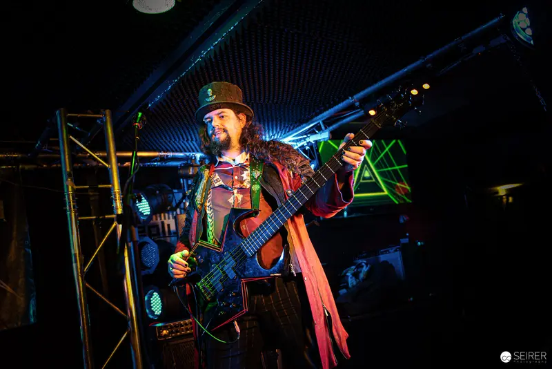Nightmarcher Bassist Performing with Vibrant Energy at Replugged Vienna