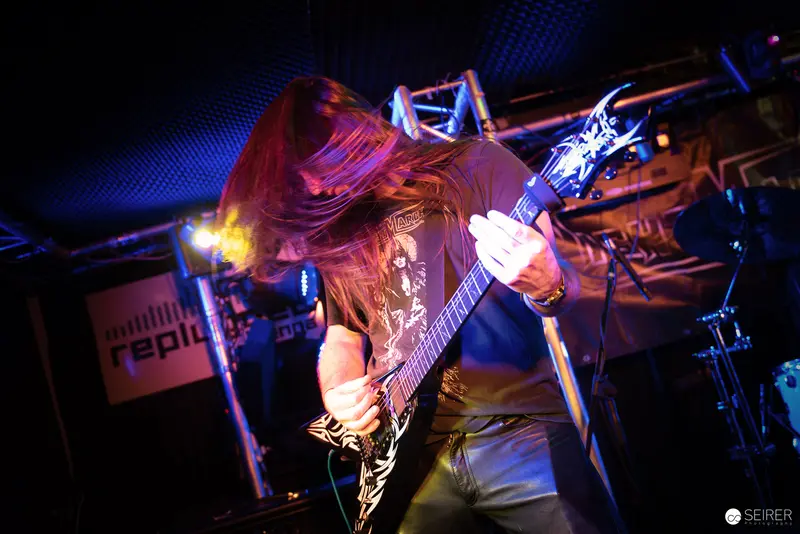 Nightmarcher Guitarist Performs Intense Rock Set at Replugged Vienna