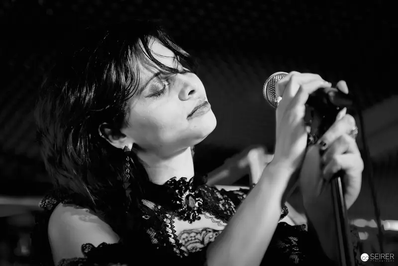 Nightmarcher's Intense Performance at Replugged Vienna in Dramatic Black and White