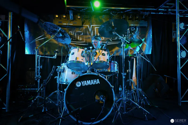 Yamaha Drum Kit Illuminated in Dynamic Stage Lighting at Nightmarcher Concert