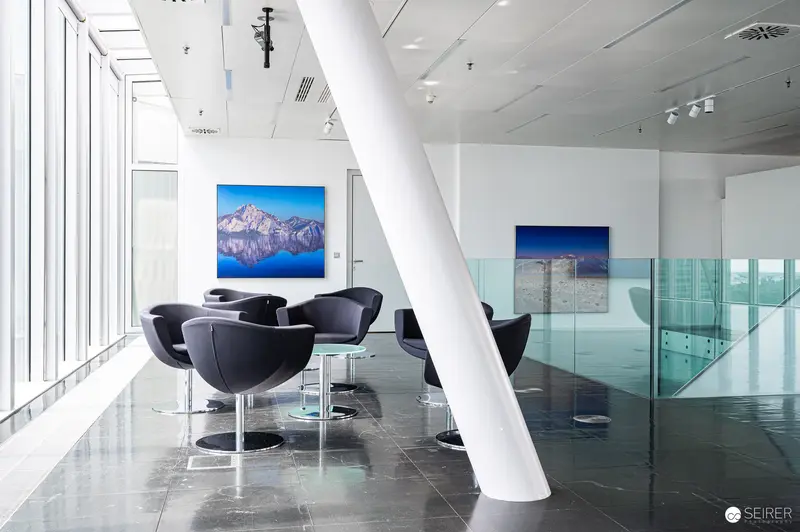 Helmut Ditsch Exhibition at Strabag Kunstforum: Mountainscape Reflections in Minimalist Interior