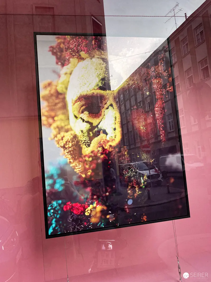 Urban Reflection: Distorted Skull Artwork in Layered Glass at KUNST HAUS WIEN