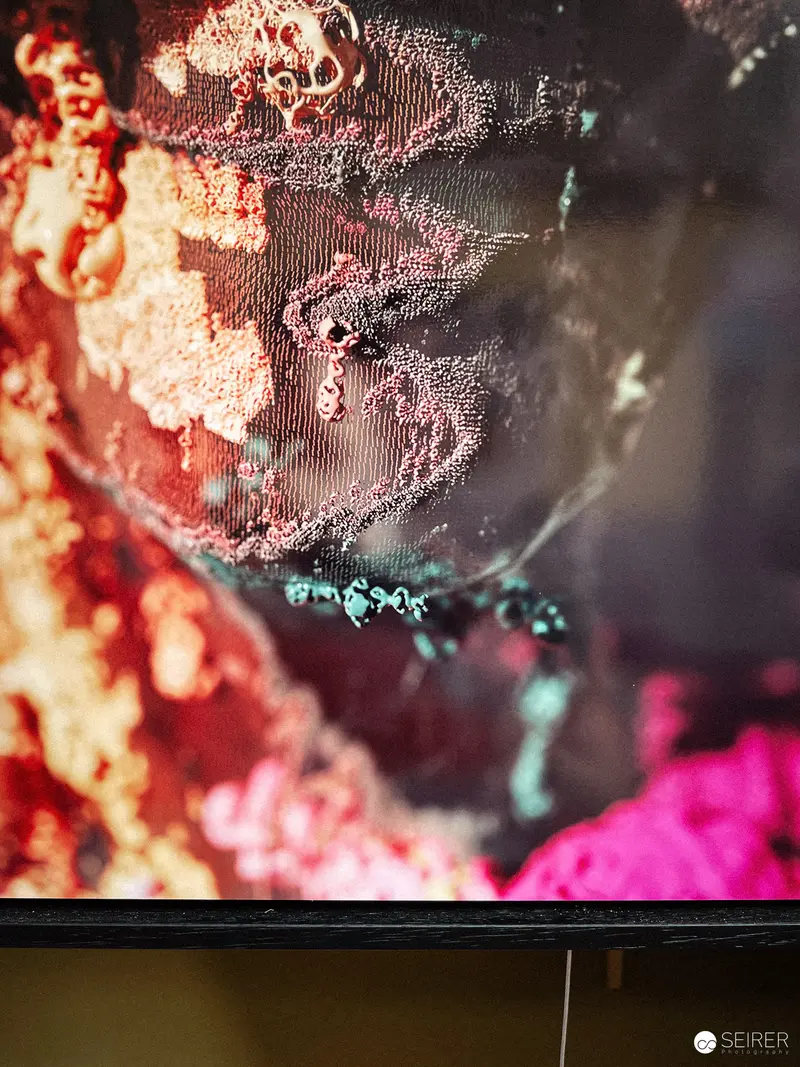 Textured Abstract Composition with Vibrant Red and Pink Chromatic Intensity