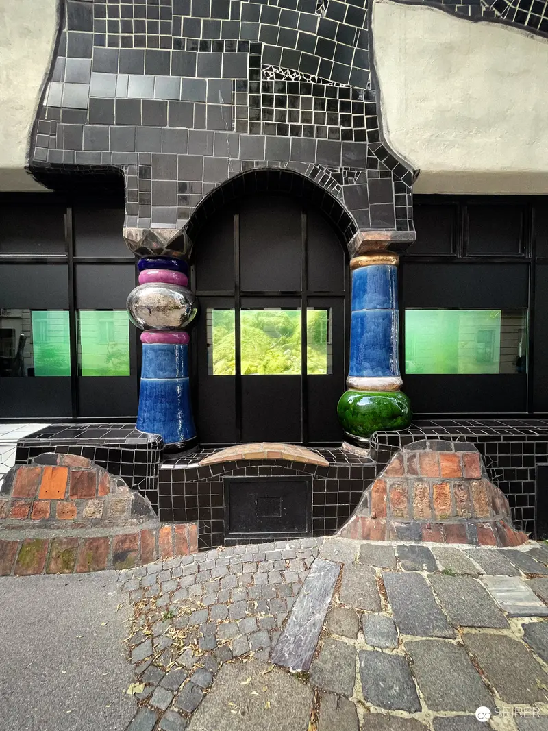 Hundertwasser-Inspired Architectural Facade with Ceramic Columns at Kunst Haus Wien