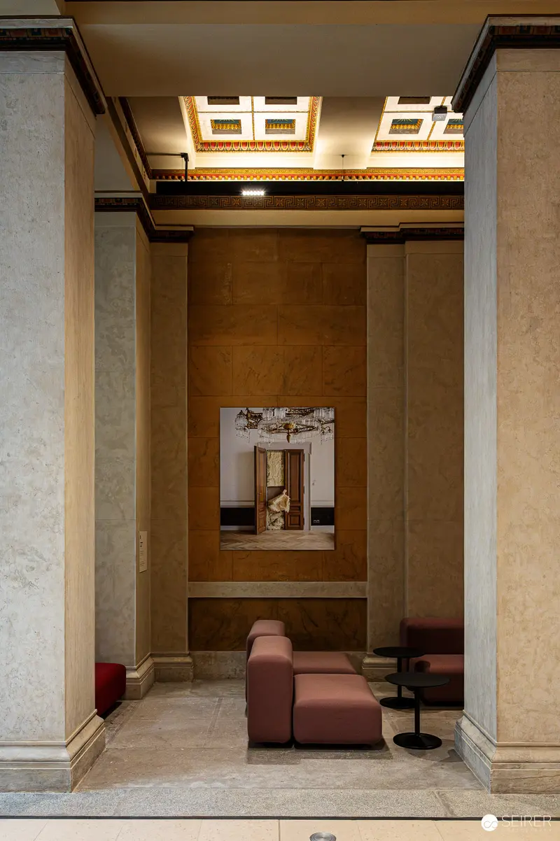 Interior View of Renovated Austrian Parliament with Minimal Architectural Seating