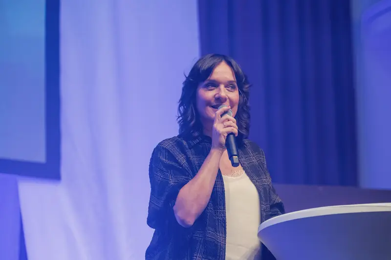 Health & Mind Festival Speaker Delivering Presentation on Stage