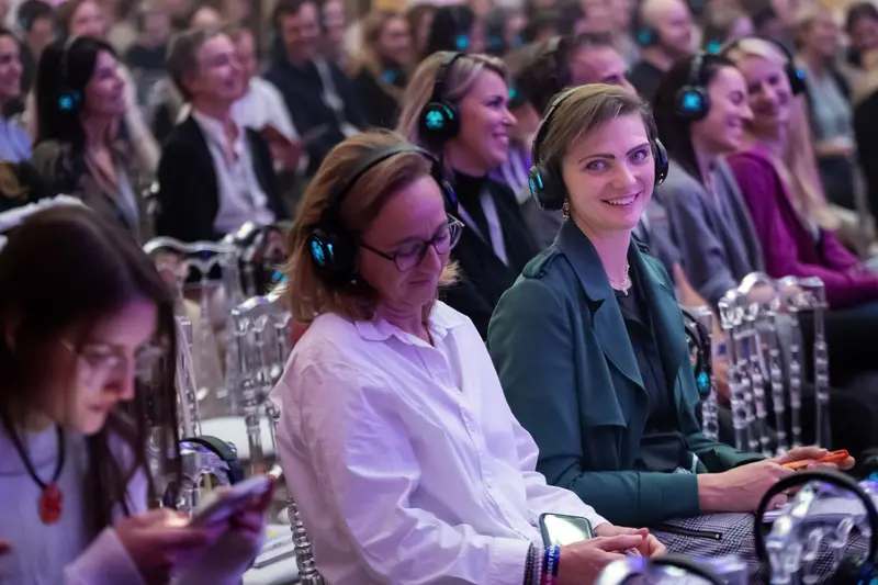 Health & Mind Festival Attendees in Wireless Listening Mode
