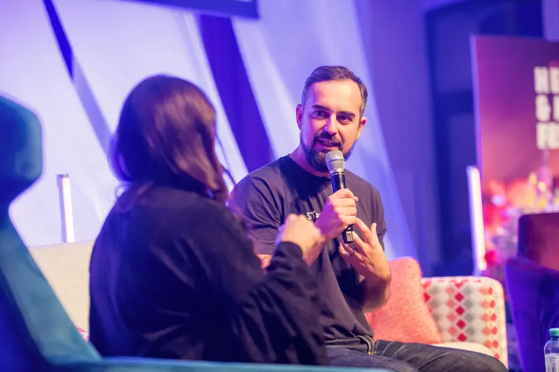 Health & Mind Festival Speaker Engaging in Intimate On-Stage Dialogue