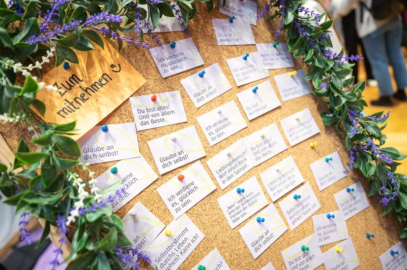 Motivational Cork Board with Inspirational Notes at Health & Mind Festival