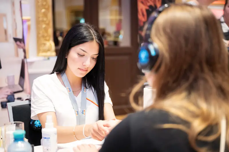 Health & Mind Festival: Nail Care Professional Providing Personalized Service
