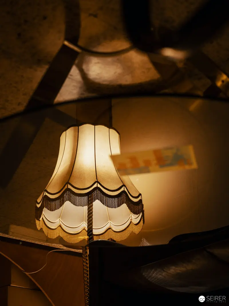 Vintage Lampshade in Warm, Shadowy Ambient Lighting