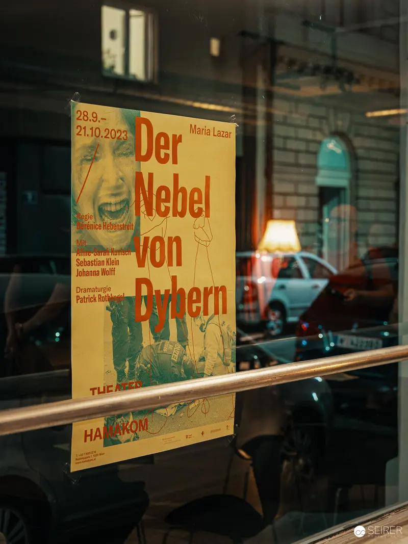 Der Nebel von Dybern Theatrical Poster in Window Reflection at Nestroyhof Hamakom
