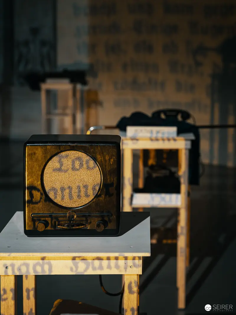 Vintage Radio Equipment in Atmospheric Lighting at Nestroyhof Hamakom Theater