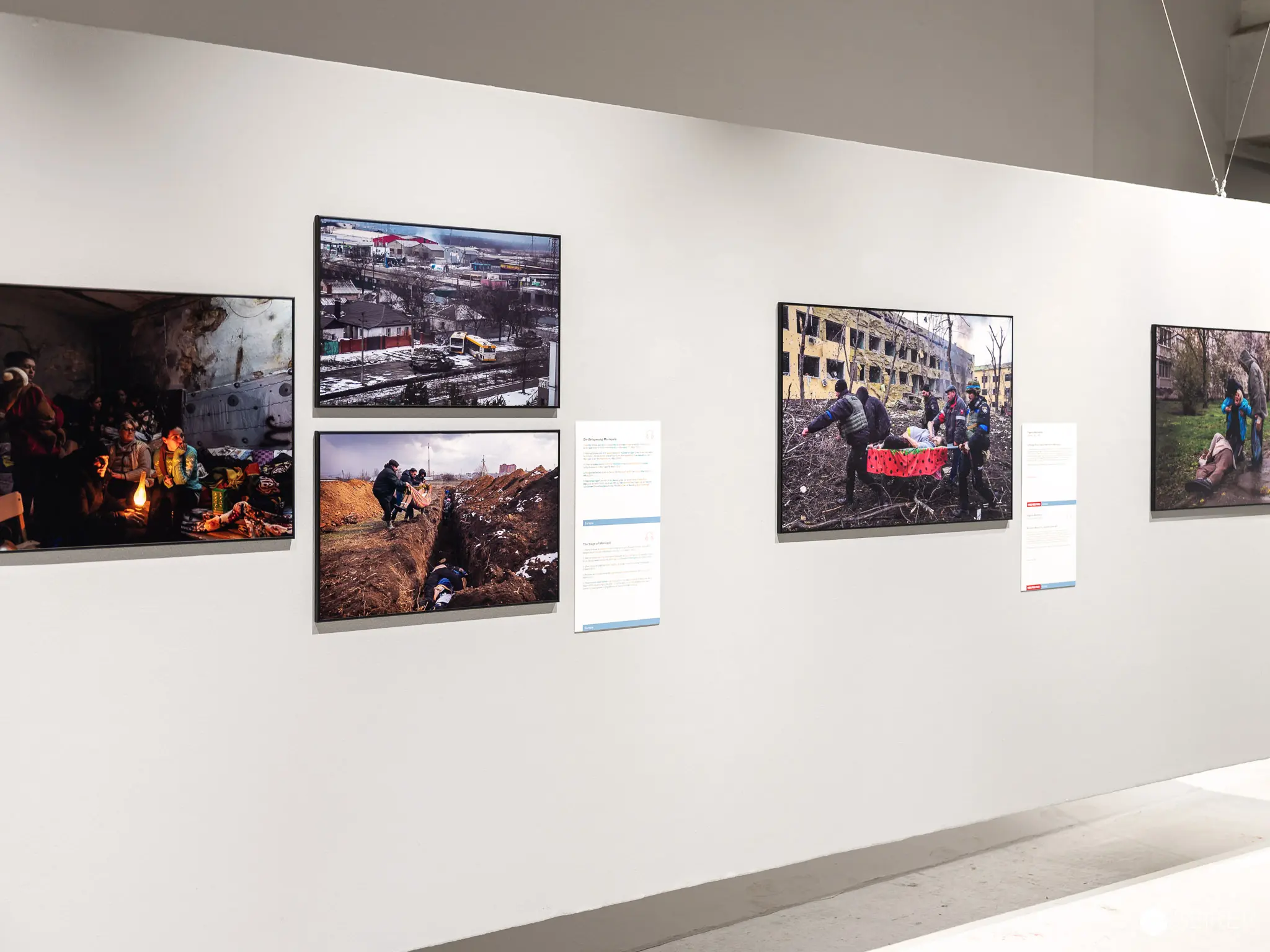 Photographic Exhibition Documenting Urban Conflict and Aftermath