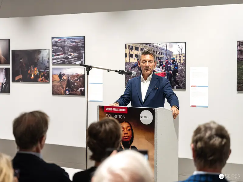 Jürgen Meindl Presenting World Press Photo Exhibition at Westlicht, Vienna