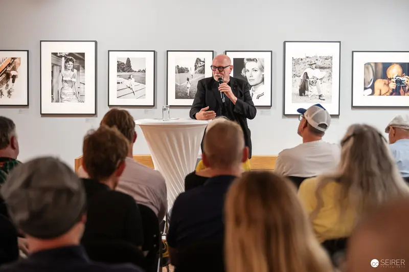 Photographer Lectures at Gallery Exhibition of Black and White Photographic Prints