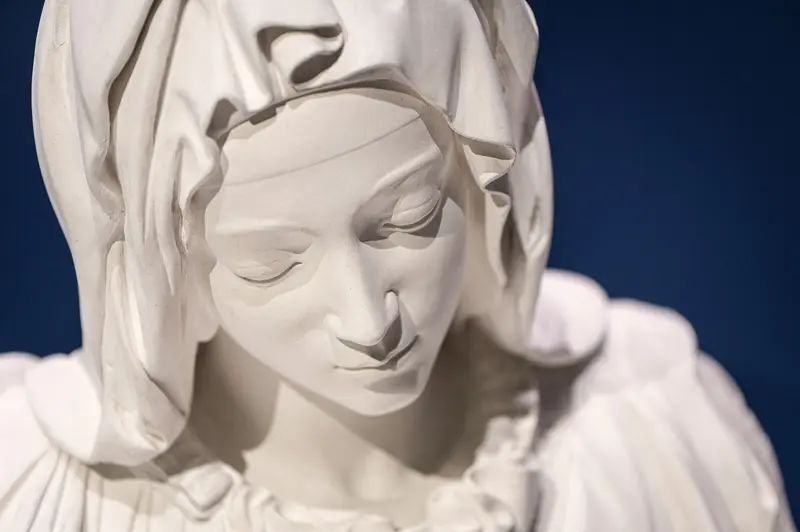 Michelangelo's Pietà: Carved Marble Sculpture of Serene Contemplative Figure
