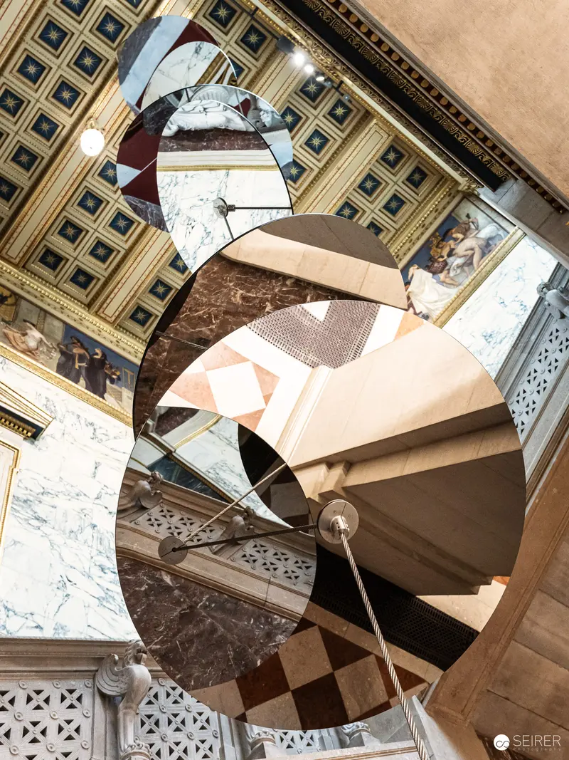Spiral Staircase with Intricate Architectural Geometries and Marble Surfaces