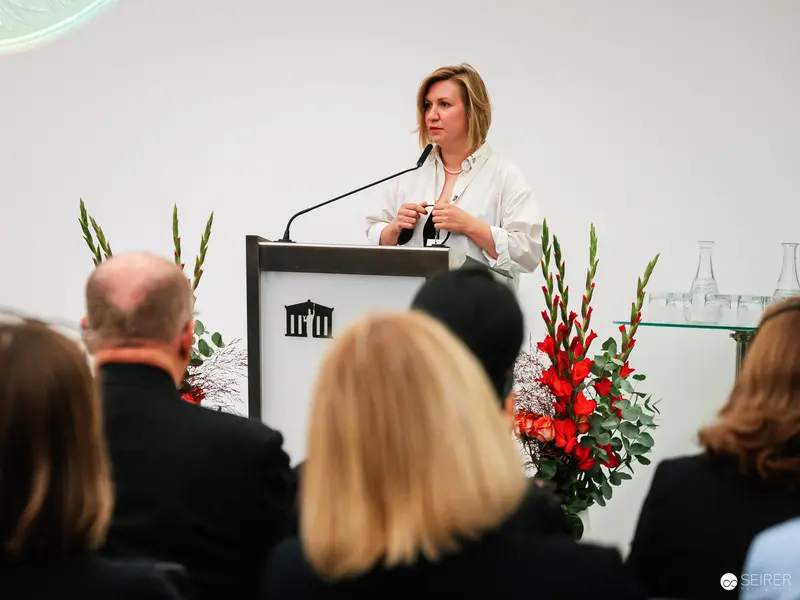 Speaker Presenting at Global Peace Photo Award Ceremony in Austrian Parliament