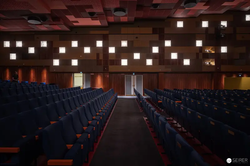 Empty Auditorium with Geometric Lighting at Vienna's Gartenbau-Kino