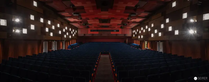 Empty Cinema Hall with Dramatic Red and Blue Color Scheme