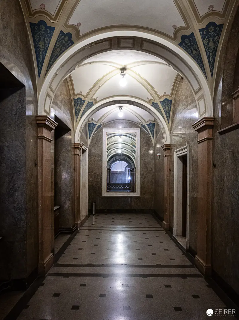 Ornate Vaulted Interior with Arched Corridor and Marble Architectural Details