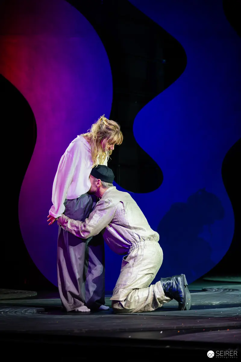 Lulu Stage Performance: Intimate Moment in Dramatic Theatrical Staging