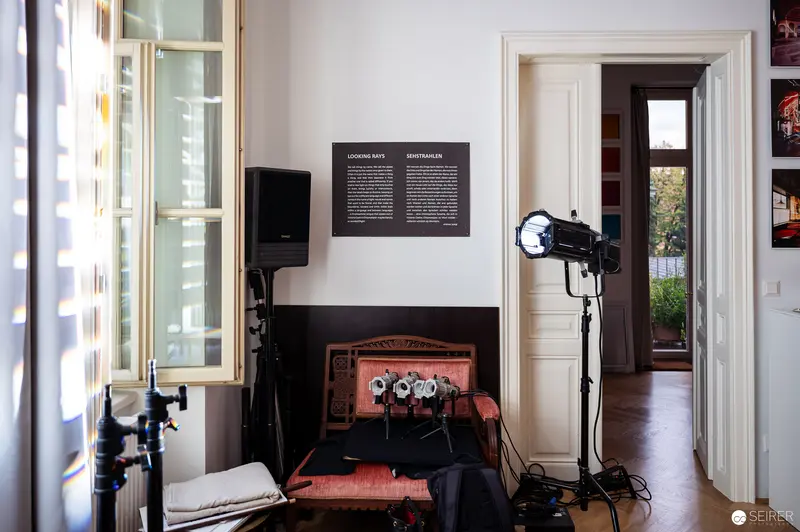 Photographic Studio Interior with Lighting Equipment and Vintage Fireplace