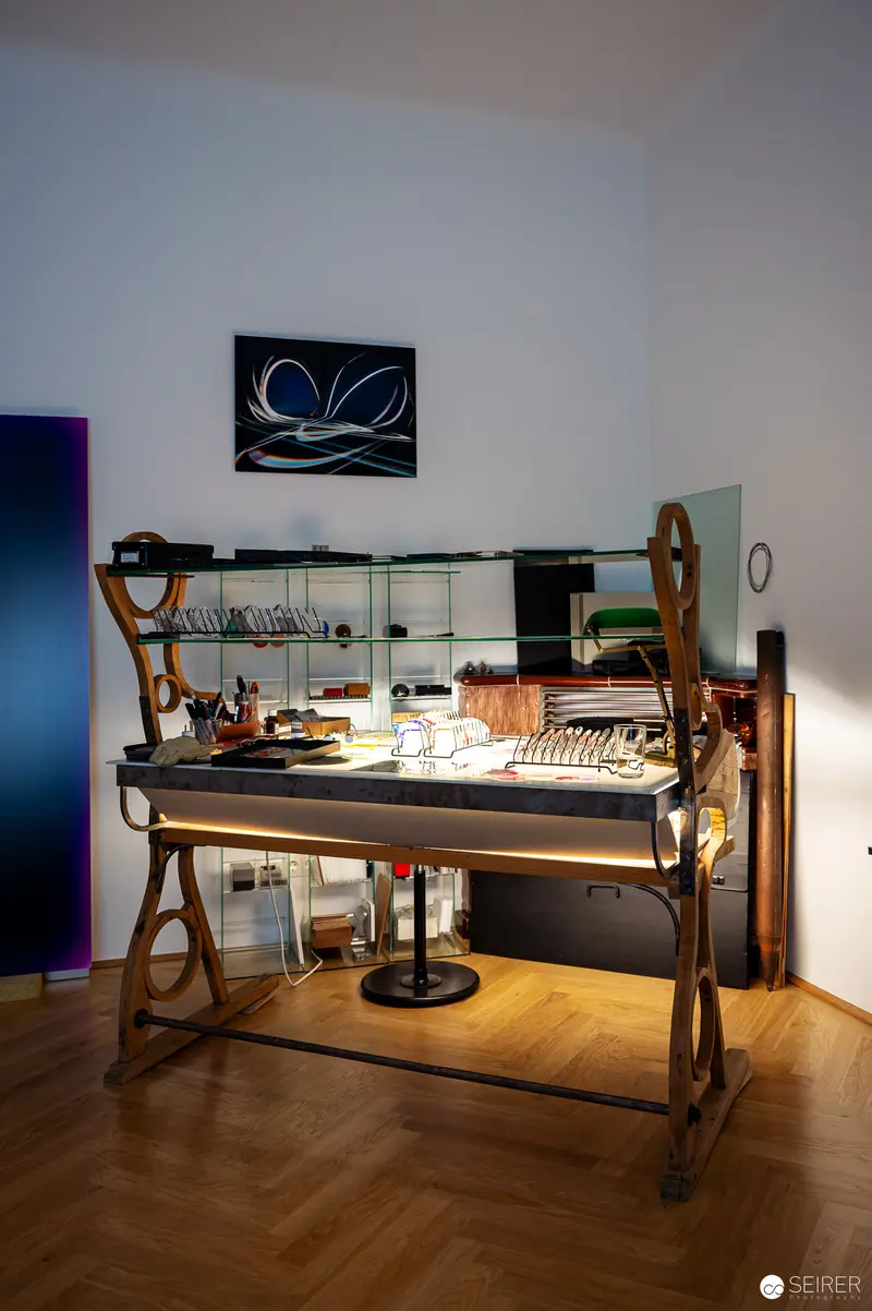 Illuminated Craftsman's Workbench with Vintage Wooden Frame and Glass Shelving
