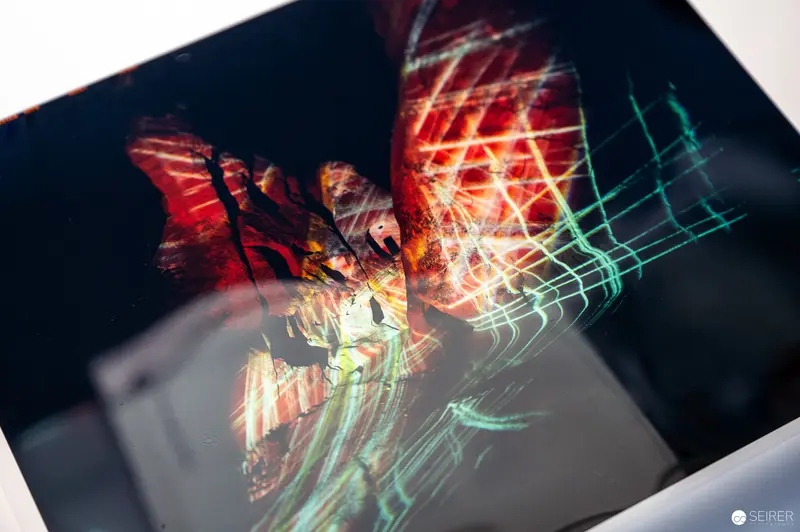 Abstract Photographic Distortion with Layered Light Trails and Chromatic Interference