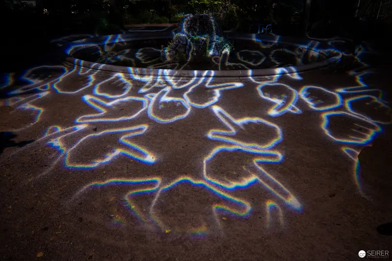 Prismatic Light Projection Creating Luminous Organic Pattern on Ground Surface