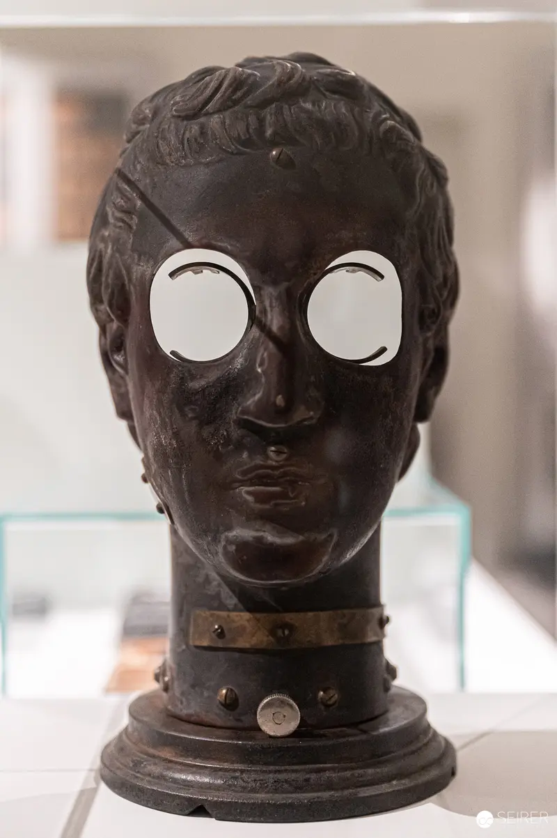 Dark Bronze Bust with Reflective Ocular Prosthetics and Studded Collar