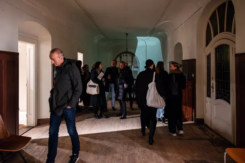 Stefanie Moshammer's Exhibition Opening: Visitors in Architectural Interior