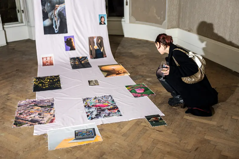 Stefanie Moshammer Reviewing Photographic Layouts During "A Fountain Playing In The Sun" Exhibition