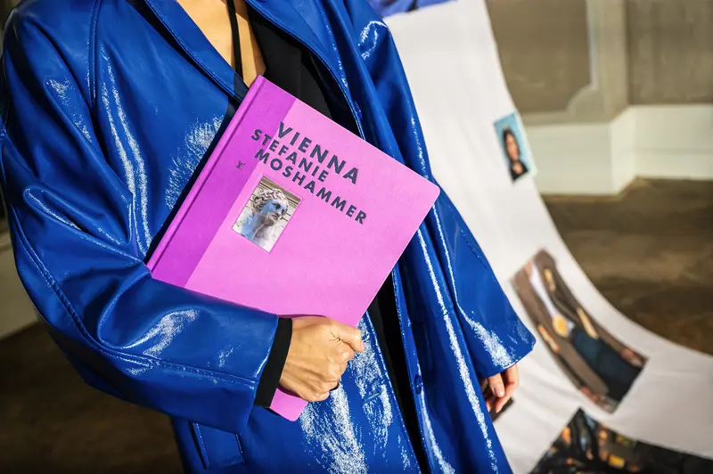 Stefanie Moshammer's Vienna Photo Book in Vibrant Blue Leather Jacket