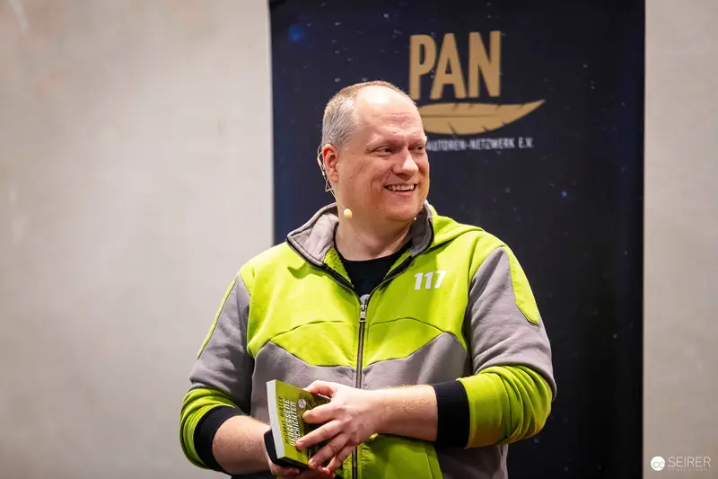 PAN Emergency Services Professional in High-Visibility Safety Vest at Event
