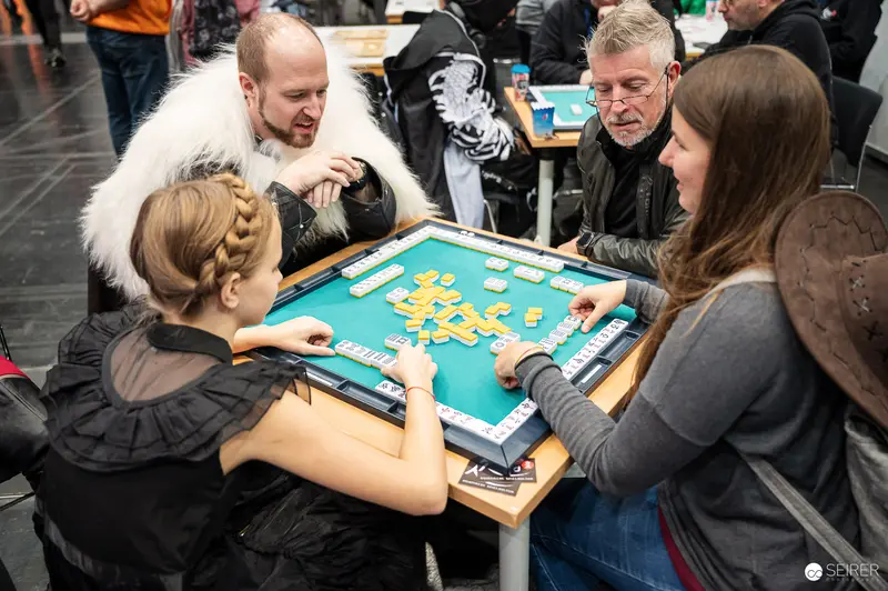 Cosplayers Playing Mahjong at Vienna ComicCon 2023 Gaming Area