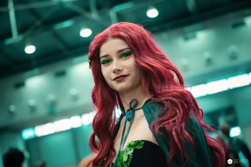 Poison Ivy Cosplayer in Vivid Red at Vienna ComicCon 2023