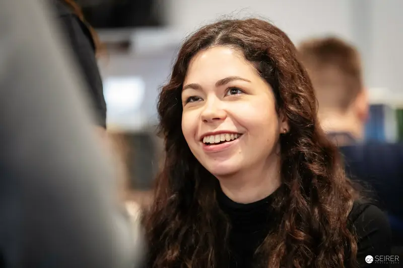 Young Woman Laughing During Vienna ComicCon 2023 Event