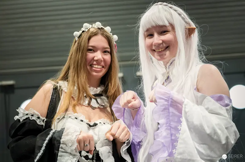 Two Cosplayers in Elaborate Fantasy Costumes at Vienna ComicCon 2023