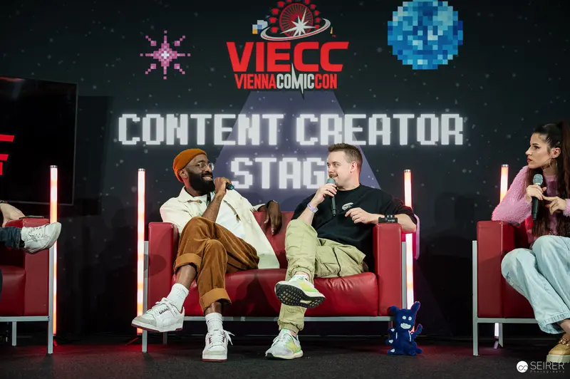 VIECC Content Creator Stage Panel with Diverse Speakers in Staged Conversation