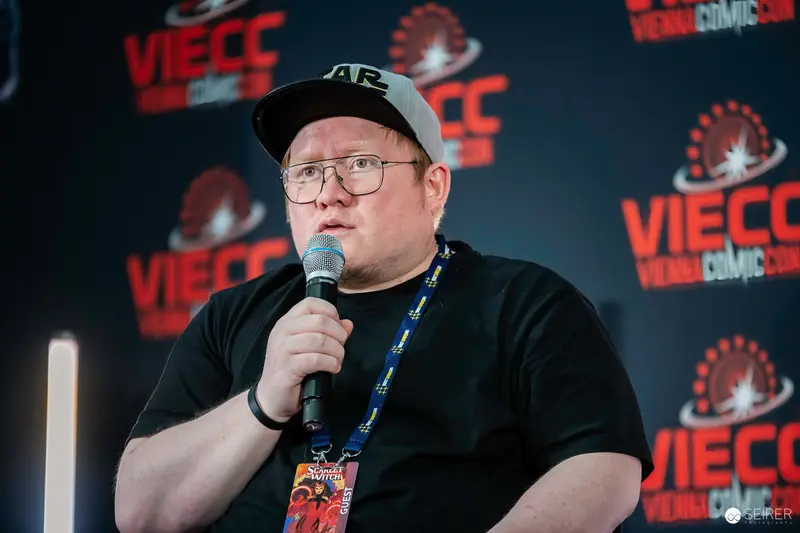 Speaker at Vienna ComicCon 2023 Discussing Comics and Pop Culture