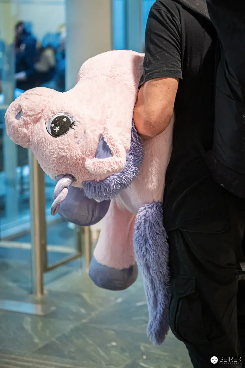 Plush Pink Unicorn Carried at Vienna ComicCon 2023 Cosplay Event