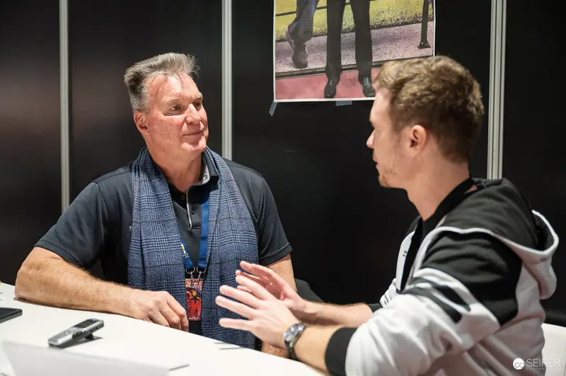 Two Men in Conversation at VIECC Comic Convention Event